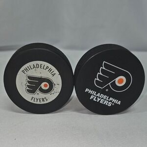 Philadelphia‎ Flyers NHL Hockey Pucks Lot of 2 Vintage In Glas Co & Modern Logo